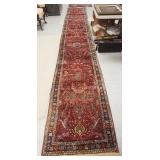 1052	LONG ORIENTAL RUNNER, END CUT, 2 FT 8 IN X 18 FT 7 IN