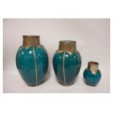 1054	GROUP OF THREE REDWARE POTTERY VASES WITH AQUA BLAZE AND DECORATIVE METAL TRIM APPLIED, LARGEST
