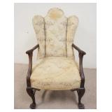1062	UPHOLSTERED ARM CHAIR W/PAW FEET & UNUSUAL CURVED ARMS, UPHOLSTERY STAINED
