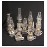 1117	GROUP OF 9 ANTIQUE KEROSENE FINGER LAMPS, TALLEST IS 16 3/4 IN