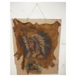 1158	PROFILE PORTRAIT OF NATIVE AMERICAN ON HIDE, HAS BEEN TACKED TO A CARDBOARD BACKING