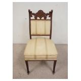 1174	FANCY VICTORIAN UPHOLSTERED SIDE CHAIR WITH CARVING AND PAINT DECORATED HIGH LIGHTS