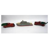 1208	3 PIECE TOY LOT, 2 PRESSED STEEL TRUCKS AND WOOD U.S. COAST DEFENSE BOAT