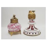 1217	2 ART GLASS LIGHTERS, WHITE CUT TO CRANBERRY AND RED AND WHITE SPATTER, TALLEST IS 6 IN