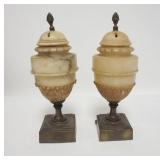 1232	PAIR OF CARVED STONE LAMPS.  LIDS HAVE HEAT VENTS, CORDS HAVE BEEN CUT, THEY HAVE METAL BASES. 