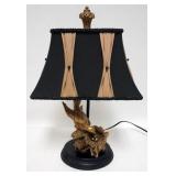 1243	TABLE LAMP W/ GILT METAL BIRD & NEST BASE, HAS A JEWELED CLOTH SHADE. 21 IN H 