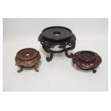 1270	LOT OF THREE CARVED WOODEN ASIAN BASES. LARGEST IS 5 3/4 IN H. ONE HAS A BROKEN FOOT (HAVE PIEC