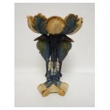 1271	TALL POTTERY COMPOTE W/ BIRD STEM. HAS A RIM CHIP. 14 IN H, 9 IN DIAMETER