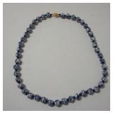 1284	ASIAN PORCELAIN BEADED NECKLACE IT IS 24 IN L