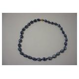 1285	ASIAN PORCELAIN BEADED NECKLACE IT IS 27 IN L
