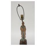 1005	CERAMIC ASIAN FIGURE MOUNTED AS A LAMP, 23 IN TOTAL HEIGHT