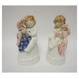 1017	PAIR OF PORCELAIN FIGURES OF CHILDREN, IMPRESSED NUMBER ON THE BASE, 11 IN HIGH