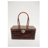 1073	TORTISE LUCITE PURSE, 9 1/2 IN X  4 1/2 IN