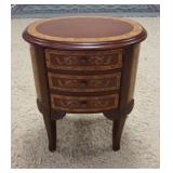 1105	OVAL PAINT DECORATED 3 DRAWER STAND. 22 IN X 16 IN, 26 IN H 
