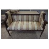 1112	UPHOLSTERED WINDOW BENCH W/ SCROLLED ARMS. SEAT HAS STAINING. 48 IN X 19 IN, 32 IN H 