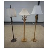 1126	LOT OF THREE ORNAMENTAL FLOOR LAMPS. TWO ARE BRASS 