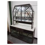 1132	ART DECO GEOMETRIC MIRRORED CABINET W/ INSET MARBLE TOP. MARBLE IS CRACKED. 56 IN X 18 IN, 72 I