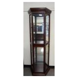 1138	NARROW BEVELED CURIO CABINET. 26 IN X 12 IN, 70 IN H 