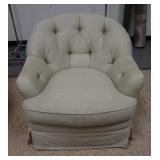 1140	TUFTED BACK UPHOLSTERED SWIVEL ARM CHAIR. UPHOLSTERY HAS SOME FADING. 