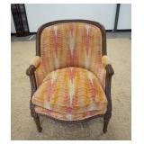 1145	CARVED UPHOLSTERED ARM CHAIR