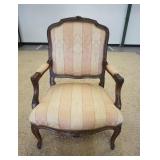 1157	FRENCH PROVINCIAL CARVED UPHOLSTERED ARM CHAIR