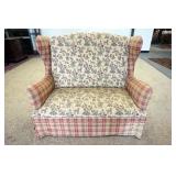 1165	UPHOLSTERED COLONIAL STYLE WINDOW BENCH WITH HIGH WING BACK SIDES, FADING ON UPHOLSTERY. 50 IN 