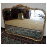 1178	FIGURAL DECORATED GILT MIRROR MADE BY FB DECORATIVE ARTS NEW YORK. 54 IN X 42 IN 