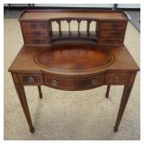 1189	MAHOGANY LEATHER TOP LADIES WRITING DESK. BACK BOARD & DRAWER BACK ARE MISSING. 32 IN X 21 1/2 