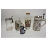1282	LOT 4 STEINS & A HERALDIC GLASS BOTTLE, TALLES IS 9 1/2 IN