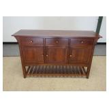 1015	ETHAN ALLEN CHERRY SIDEBOARD *AMERICAN EXPRESSIONS*  3 DRAWERS, 3 DOORS, HAS A BOTTOM SHELF.  6