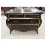 1019	BOMBE CHEST W/ TOOLED & GILT LEATHER FINISH, HAS 4 DRAWERS. 44 IN W, 32 1/2 IN H 