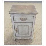 1023	PAINT DECORATED 1 DRAWER 1 DOOR STAND HAS DISTRESSED STYLE FINISH. 16 1/4 IN X 14 IN, 25 1/2 IN