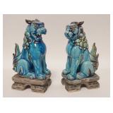 1045	PAIR OF AQUA GLAZED FOO DOGS, ONE HAS NICK ON TOOTH, 8 IN H 