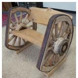 1065	UNUSUAL WAGON WHEEL BENCH SIGNED ALPH OMEGA, 48 IN WIDE X 37 IN DEEP