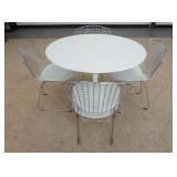 1114	MODERN ROUND TABLE W/4 STEEL CHAIRS, TABLE IS 41 1/2 IN DIAMETER, 28 12 IN HIGH