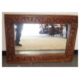 1122	MIRROR IN CARVED FRAME, 42 1/2 IN X 31 IN