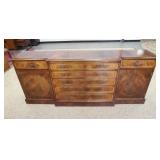 1135	MAHOGANY SIDEBOARD W/BANDED TOP, 6 DRAWERS & 2 DOORS, HAS FINISH WEAR ON TOP, HAND MADE BY TROS