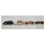 1040	LOT OF FOUR FRANKLIN MINT 1:24 SCALE DIE CAST MODEL CARS. LOT INCLUDES A 1930 CADILLAC, A 1911 