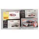 1046	LOT OF FOUR ACTION COLLECTABLES NASCAR 1:24 SCALE MODEL CARS. INCLUDING ONE MOUNTED ON A BASE W