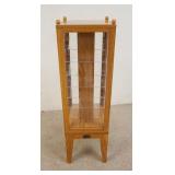 1123	OAK FLOOR/COUNTER TOP REVOLVING DISPLAY CABINET W/TAG THOMAS CLASSICS, 41 IN HIGH X 12 IN X 12 
