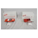 1143	LOT OF TWO DIE CAST 1:24 SCALE OLDSMOBILE MODEL CARS FROM THE DANBURY MINT. LOT INCLUDES;  1970