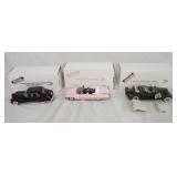 1150	LOT OF THREE DIE CAST 1:24 SCALE CADILLAC MODELS FROM THE DANBURY MINT. LOT INCLUDES; 1959 CADI