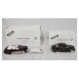 1151	LOT OF TWO DIE CAST 1:24 SCALE MODEL CARS FROM THE DANBURY MINT. LOT INCLUDES; 1949 MERCURY CLU