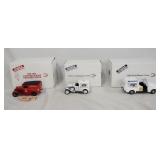 1154	LOT OF THREE DIE CAST 1:24 SCALE TRUCK MODELS FROM THE DANBURY MINT. LOT INCLUDES; THE 1931 CAM