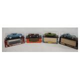 1266	LOT OF FOUR DIE CAST 1:18 SCALE MODEL CARS IN DISPLAY CASES W/ ORIGINAL BOXES. LOT INCLUDES; 19