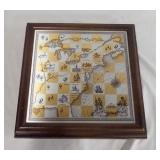 1281	THE AMERICAN WAR FOR INDEPENDENCE CHESS SET, WITH PIECES. HAS SOME MINOR WEAR. 14 1/2 IN SQ