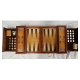 1282	EXCALIBER BACKGAMMON SET W/ PIECES FROM THE FRANKLIN MINT. PIECES ARE DATED 1986.  26 IN X 14 3