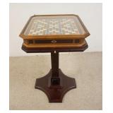 1285	SCRABBLE COLLECTORS EDITION GAME TABLE W/ GOLD TONE PIECES. 19 1/2 IN W, 19 1/2IN DEEP, 32 IN H