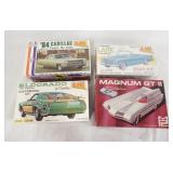 1294	4 VINTAGE MODEL CAR KITS, JO-HAN & MPC, JO-HAN STUDEBAKER LARK SEALED IN BOX, REST POSSIBLY COM