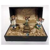 1001	3 COLD PAINTED BRONZE FIGURES OF JESTERS WITH MOTHER OF PEARL AND STONE. CENTER NEEDS TO BE REA